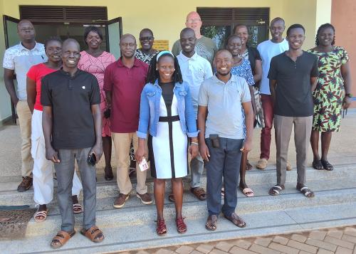 The team in front af the community building